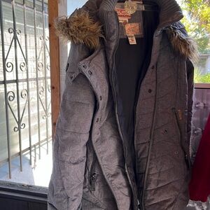 Khoujo ladies jacket with die trimmed hood. Very nice condition. Size XL.